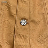 Flat lay presentation of Louis Vuitton luxury clothing with tailored silhouette
