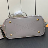  Understated carryall bag carried on shoulder 16