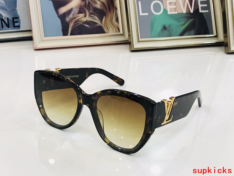 Close-up detail view of Louis Vuitton unisex sunglasses