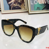 Close-up detail view of Louis Vuitton unisex sunglasses