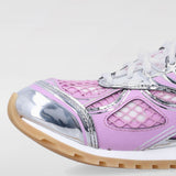 Close-up of Bottega Veneta athletic hardware and fine stitching