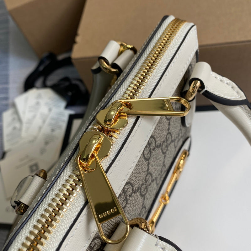 Styled lifestyle shot of structured chic women's handbag – women's statement bag