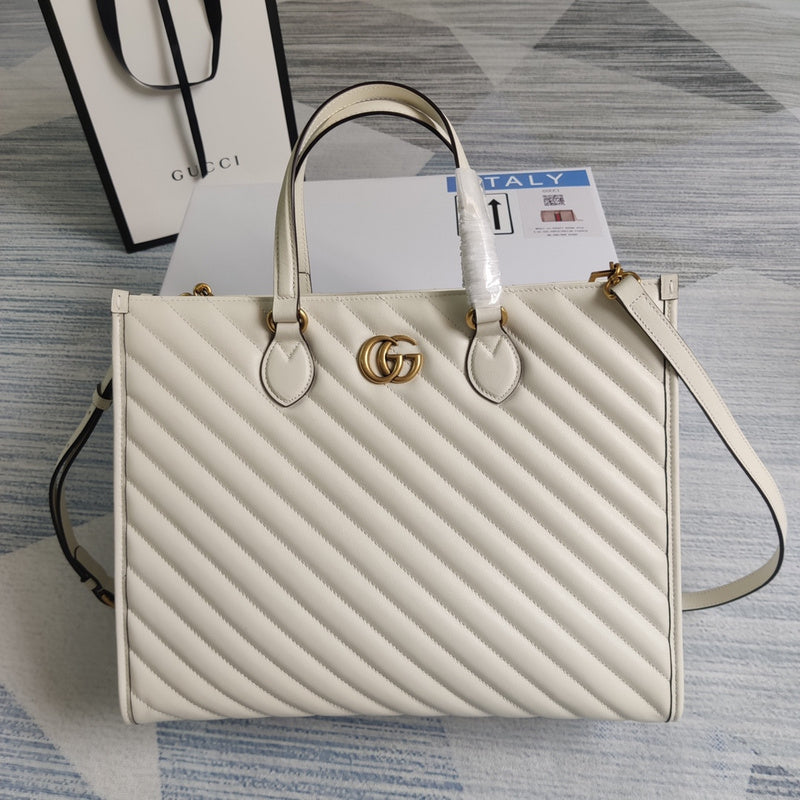 Front view of chic sleek women's handbag – women's statement bag