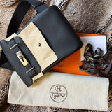 Side view of versatile structured handbag