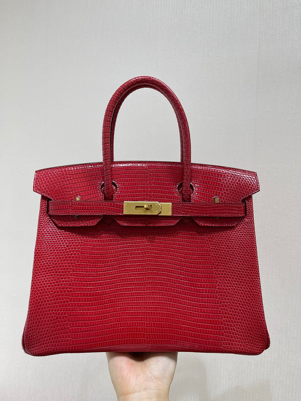 Side view of graceful structured handbag