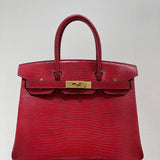 Side view of graceful structured handbag