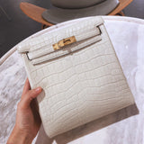Side view of sculpted structured handbag
