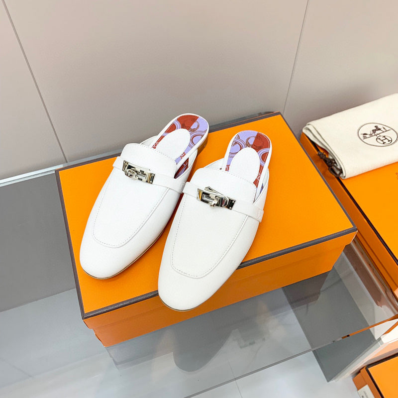 Hermès White Slide Sandals - Angled View