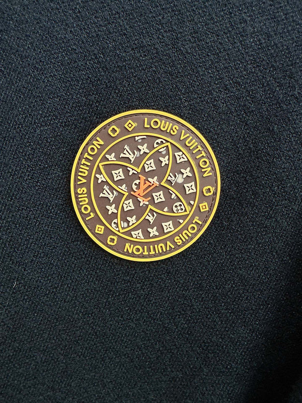 Flat lay presentation of Louis Vuitton luxury clothing with contemporary cut