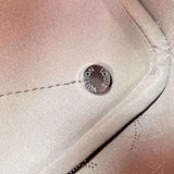 Front view of chic polished women's handbag – women's luxury handbag
