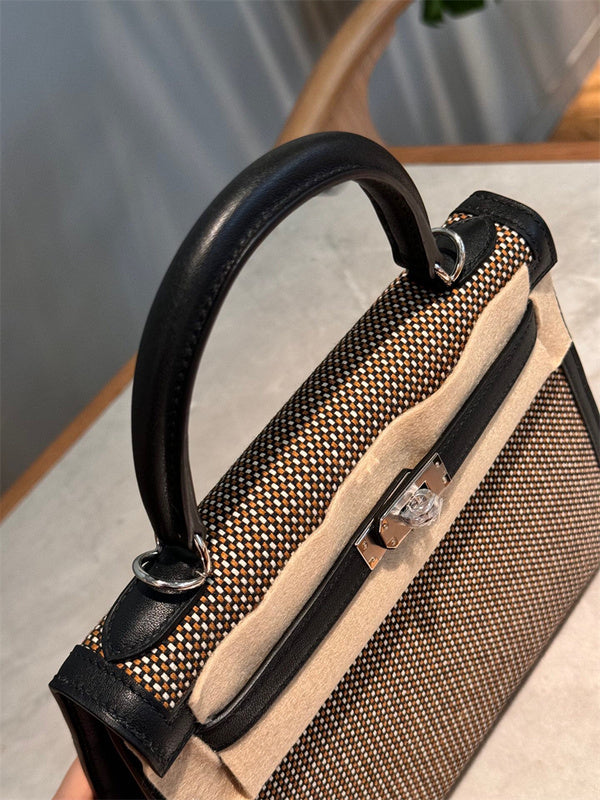 Side view of refined structured handbag
