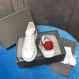 Alexander McQueen neutral cream luxury sneakers view 7 minimalist modern build