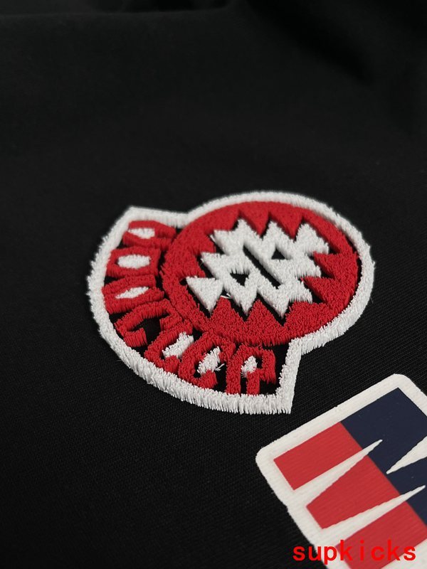 Front view of Moncler luxury clothing with contemporary cut