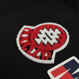 Front view of Moncler luxury clothing with contemporary cut