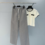 Celine Trousers – luxury designer piece with signature house detailing