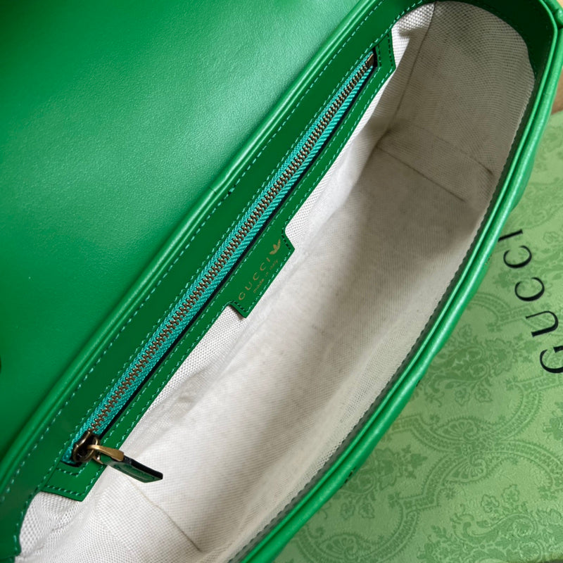 Side profile of structured statement women's handbag – women's statement bag