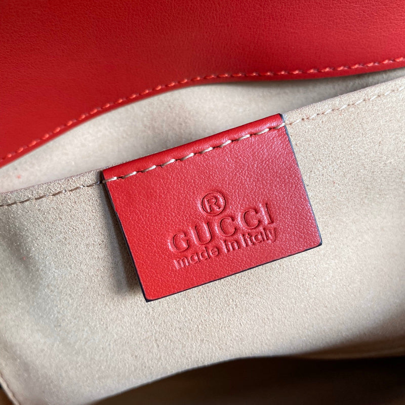 Side profile of refined classic women's handbag – women's statement bag