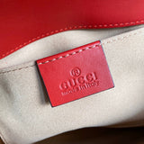 Side profile of refined classic women's handbag – women's statement bag