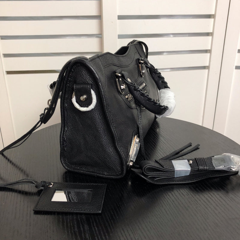 Styled lifestyle shot of elevated modern women's handbag – women's statement bag