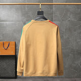 Side profile of Gucci luxury clothing with signature branding