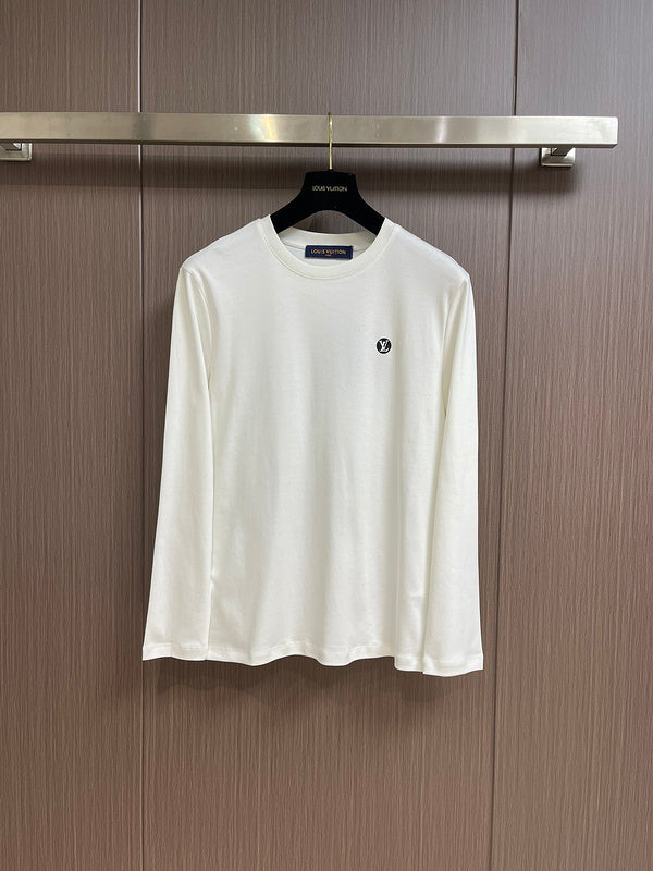 Front view of Louis Vuitton luxury clothing with tailored silhouette