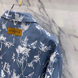 Front view of Louis Vuitton luxury clothing with label-forward styling