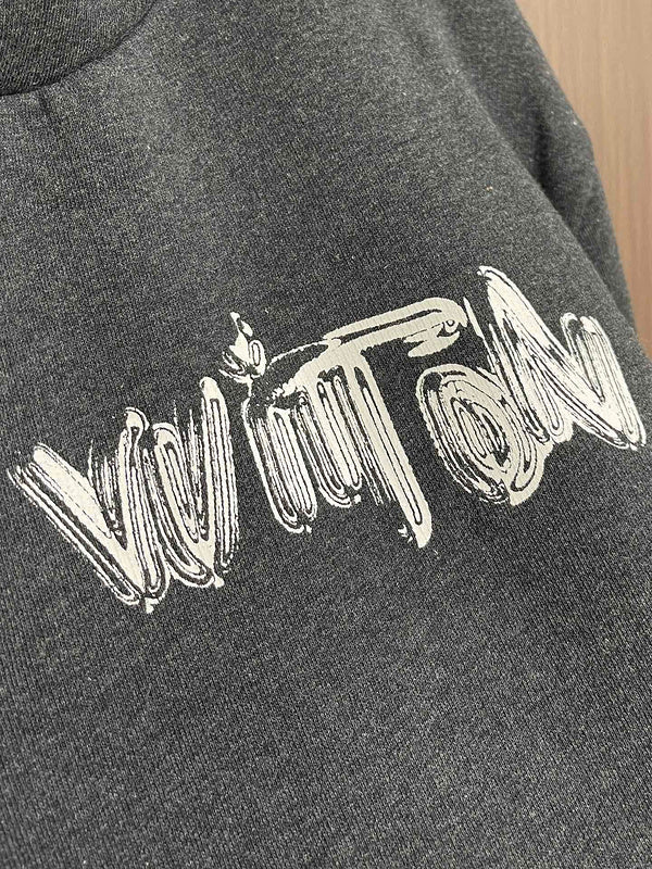 Front view of Louis Vuitton luxury clothing with signature branding