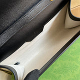 Side profile of polished statement women's handbag – women's premium purse