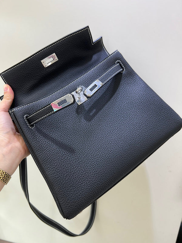 Side view of polished structured handbag