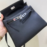 Side view of polished structured handbag