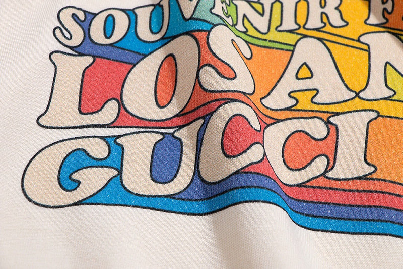 Front view of Gucci luxury clothing with signature branding