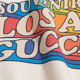 Front view of Gucci luxury clothing with signature branding