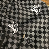 Full styled look of Louis Vuitton cotton t-shirt with streetwear-inspired cut