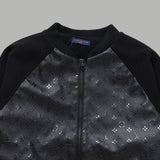 Full styled look of Louis Vuitton luxury clothing with signature branding
