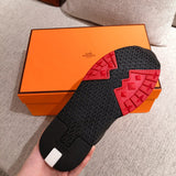 Hermès White High-Top Sneakers - Close-Up Texture View