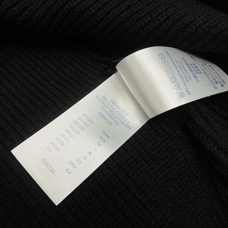 Back view of Louis Vuitton luxury clothing with monogram-inspired silhouette
