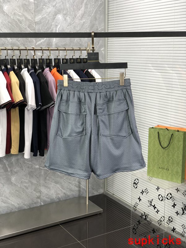 Side profile of Rhude luxury clothing with monogram-inspired silhouette