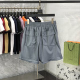 Side profile of Rhude luxury clothing with monogram-inspired silhouette