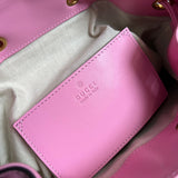 Side profile of signature statement women's handbag – women's premium purse