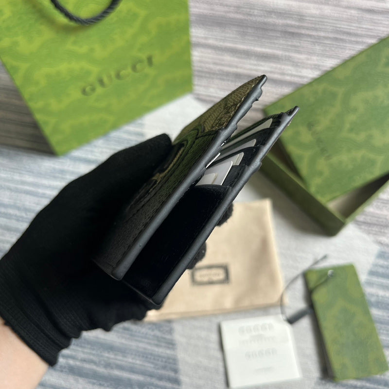 Back view of elevated signature women's handbag – women's statement bag