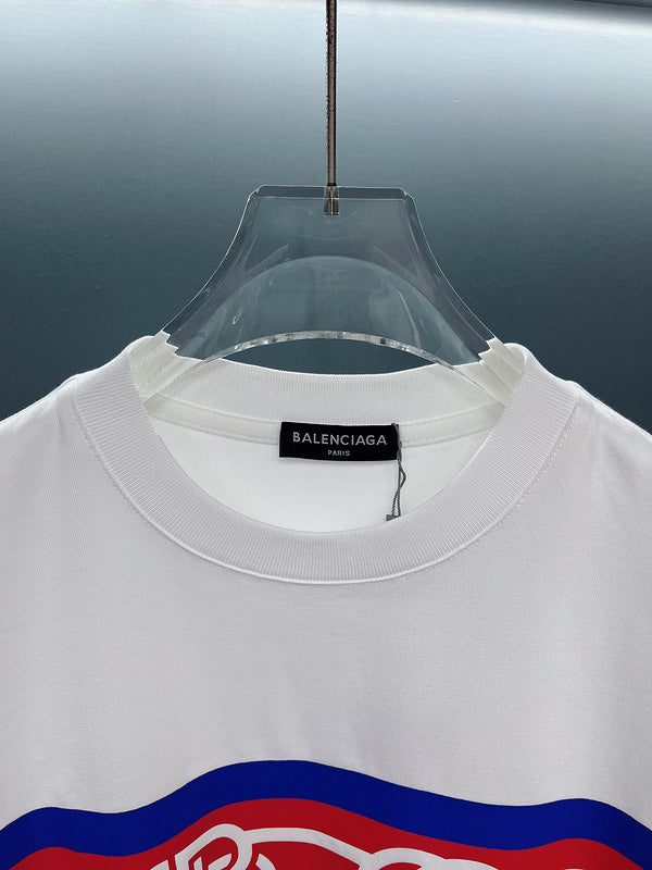 Flat lay presentation of Gucci luxury clothing with monogram-inspired silhouette