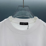 Flat lay presentation of Gucci luxury clothing with monogram-inspired silhouette