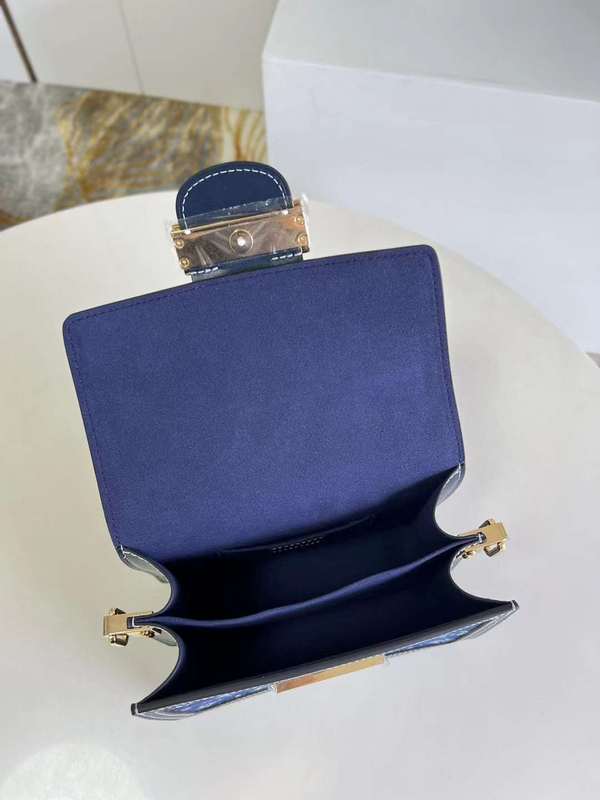 Top view of chic statement women's handbag – women's luxury accessory