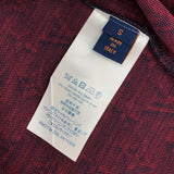Flat lay presentation of Louis Vuitton cotton t-shirt with label-forward styling