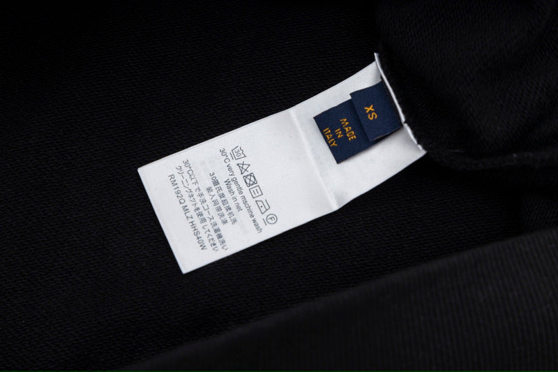 Close-up detail shot of Louis Vuitton luxury clothing with relaxed-fit cut