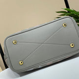  Tailored crossbody bag carried on shoulder