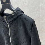 Side profile of Louis Vuitton luxury clothing with label-forward styling