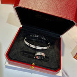 Angled view of Cartier unisex jewelry piece