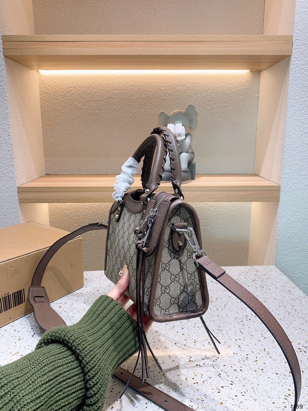 Ziva's Charm handbag – carry view (one versatile size)