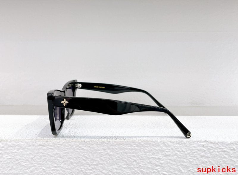 Close-up detail view of Louis Vuitton unisex sunglasses